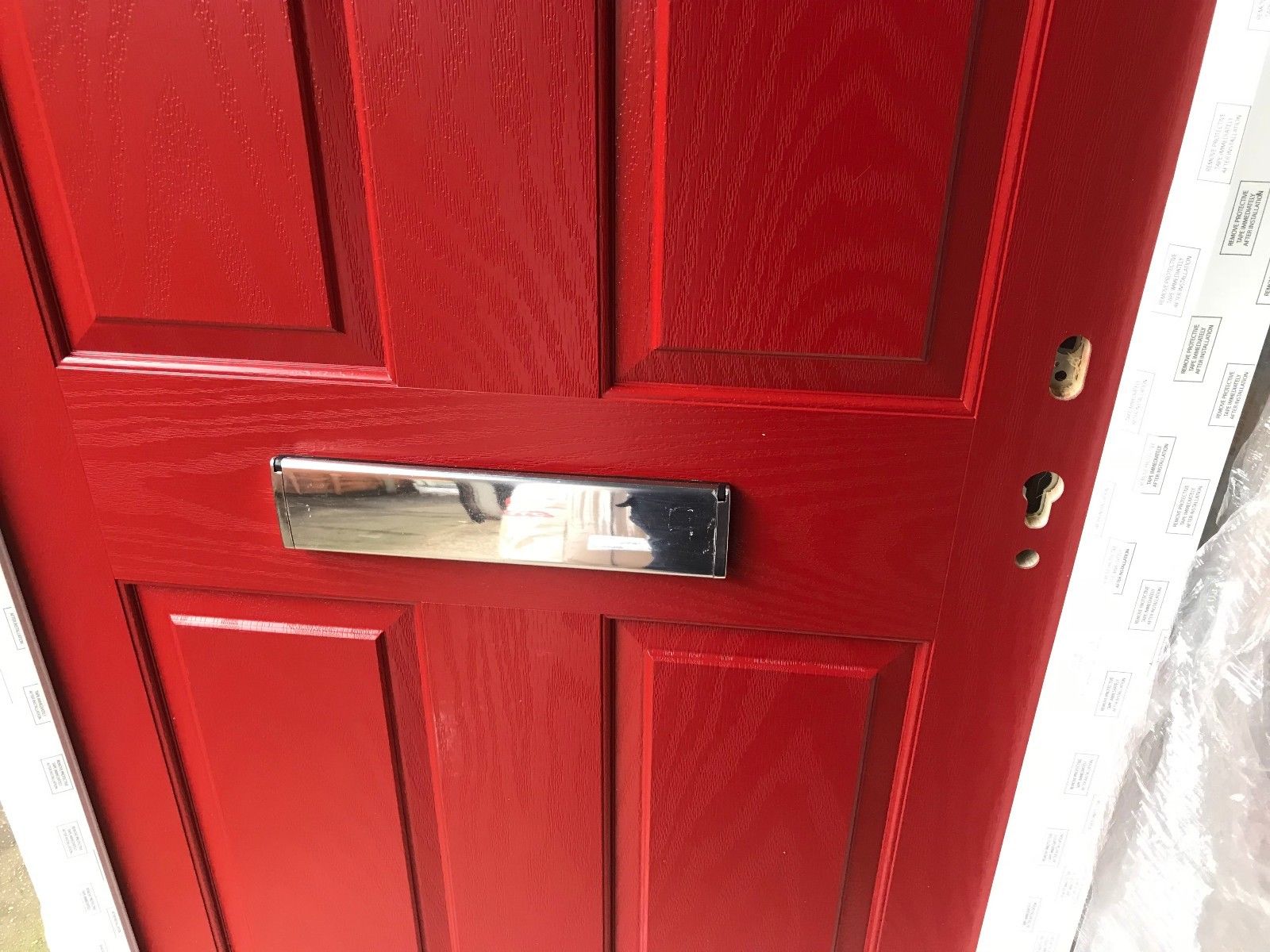 Hormann ThermoComp TR01 with Fanlight in Signal Red